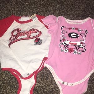 2 Georgia bulldog onesies.